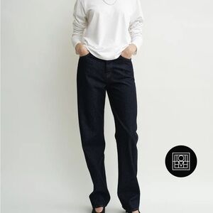 Toteme twisted seam jeans in raw indigo